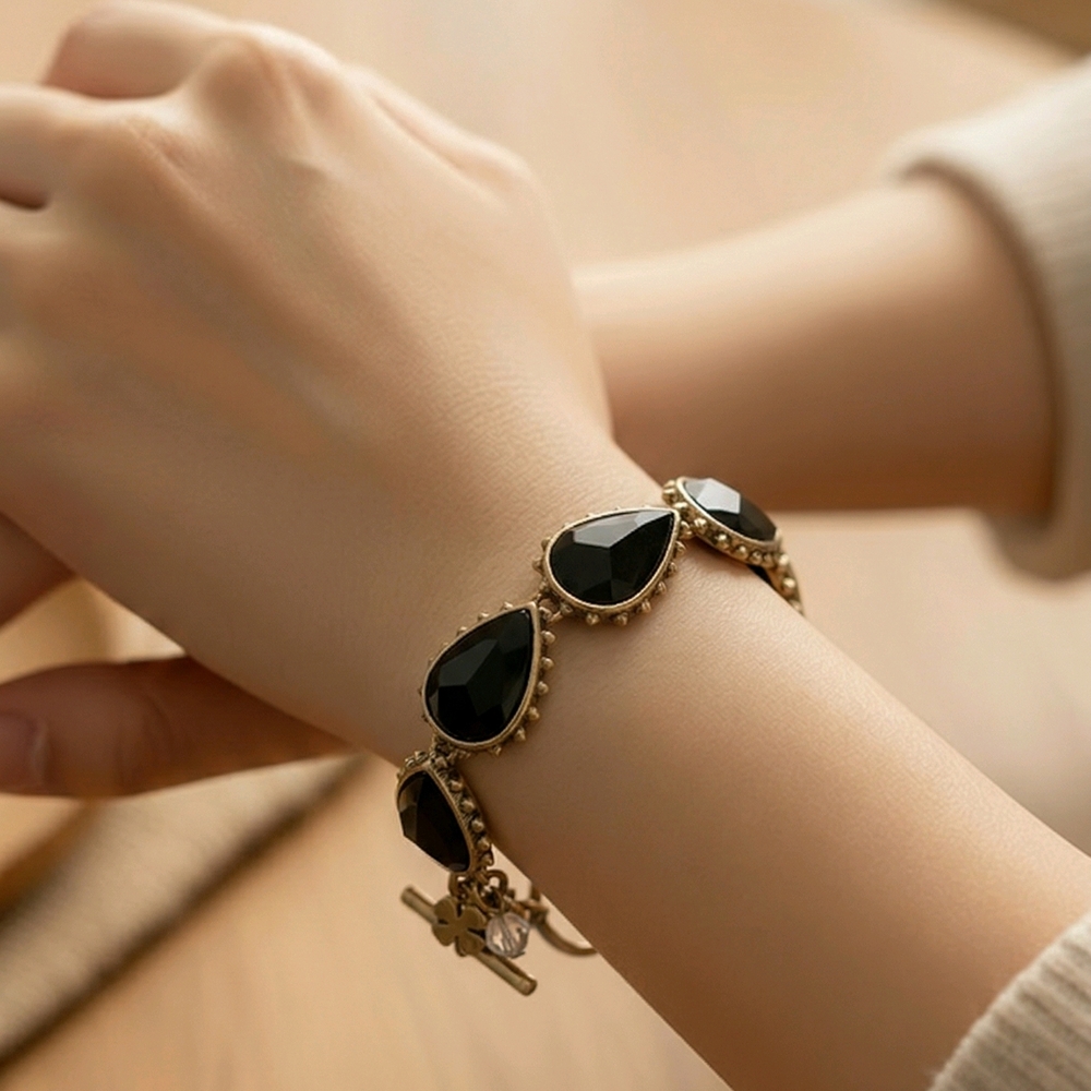Lucky Brand Bronze-tone Bracelet with Black Teardrop Stones